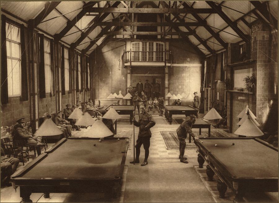 A pool hall with billiards tables