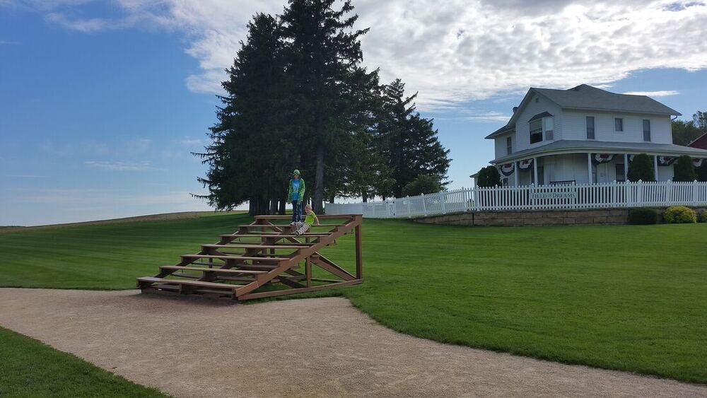 The Field of Dreams movie site with its farmhouse and mown diamond